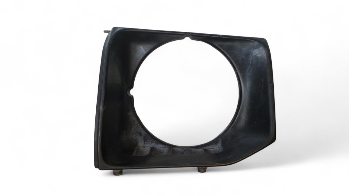 Moldura optico izquierdo Mitsubishi Montero